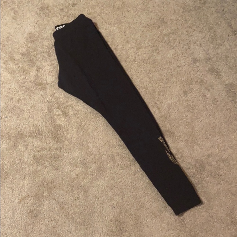 Nike leggings with sparkly writing on calf
